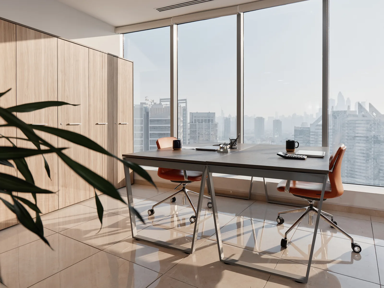 The Peak Group office in Dubai, morning light over the skyline
